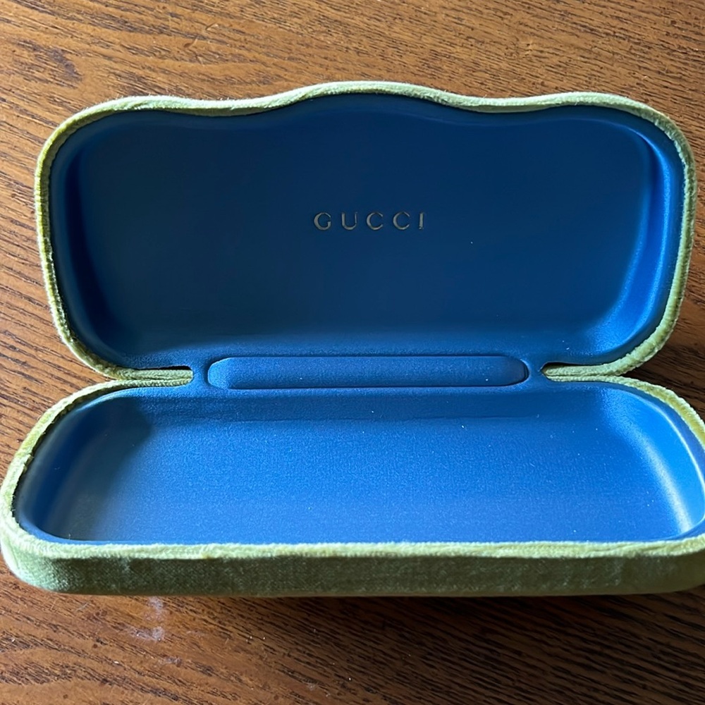Gucci glasses case.